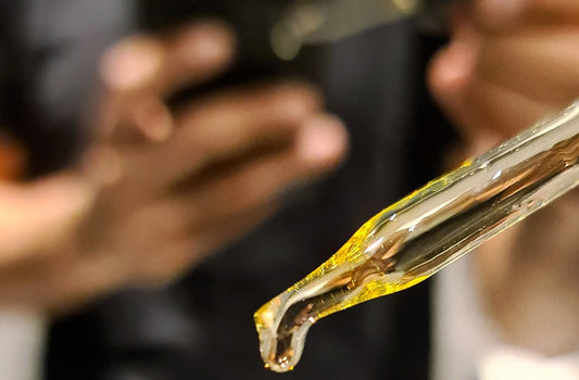 beard oil in a dropper