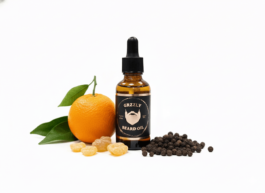 A Amber glass bottle of all natural handmade Best Beard oil, Frankenstein sweet mandarin frankincense and black pepper