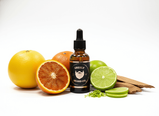 A amber glass bottle of all natural handmade beard oil Citrus fusion, pink grapefruit, Orange, lime & cedarwoood.